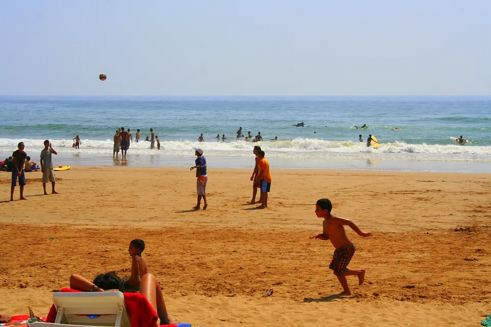 Sandy beach in Tamraght with gentle waves