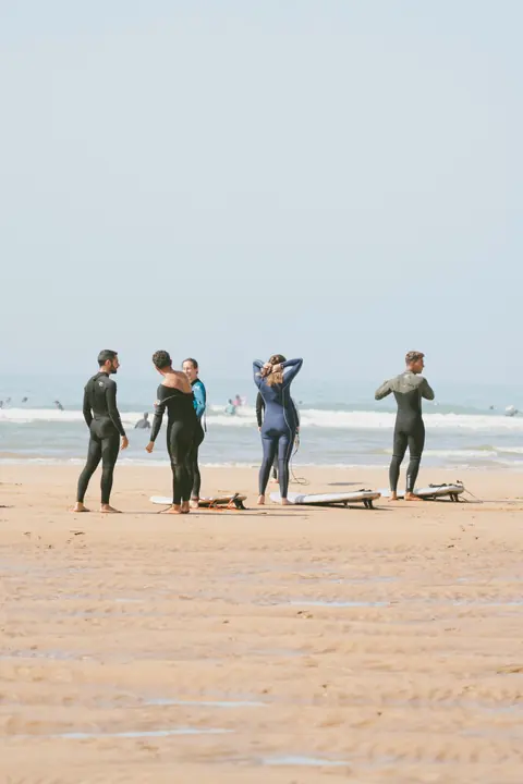Surf Nest group getting ready on the beach